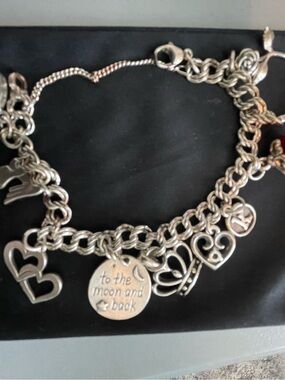 Authentic James Avery silver charm bracelet with 10 JA charms!